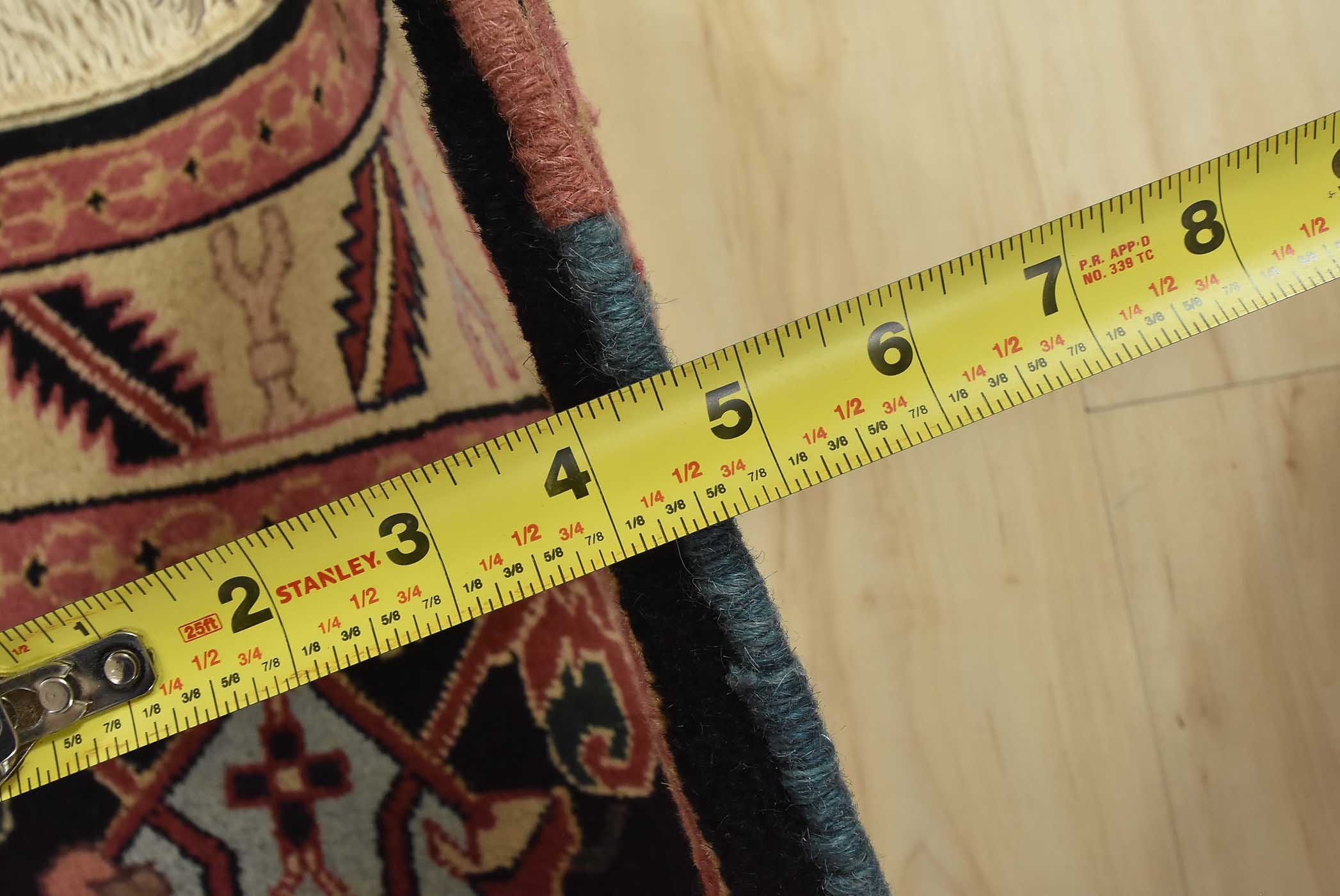 6956.95